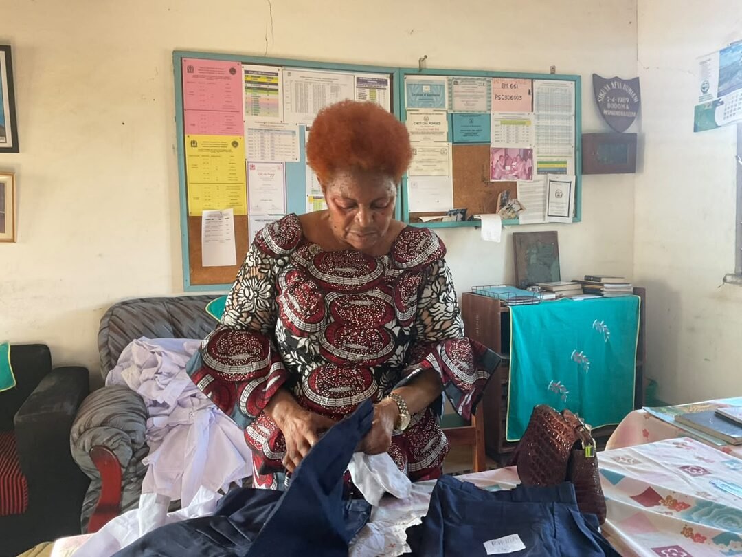 Sorting donated clothing indoors